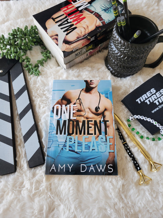 One Moment Please Model Paperback